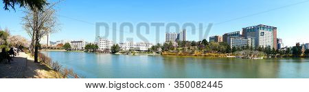 Seoul, South Korea - April 8 2019 : Residents And Students Take A Rest At Ilgam-ho Lake At Konkuk Un