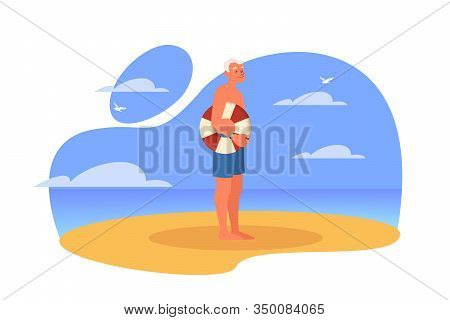 Happy And Active Senior Spending Time On The Beach.