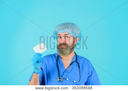 Doctor With Pills. Medicine. Nurse. Package Of Pills. Treatment Pill. Pharmaceutical Drug. Bearded D