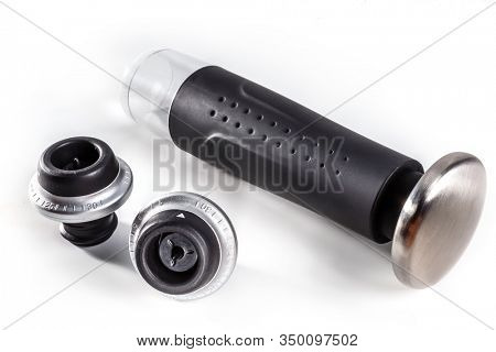 Wine pourer and wine stopper on white background