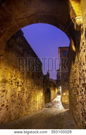 Intramural Street Of The Old Part Of Caceres After The Rain At Night