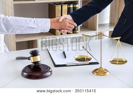 Handshake After Good Deal Negotiation Cooperation, Professional Female Lawyer Or Counselor And Clien