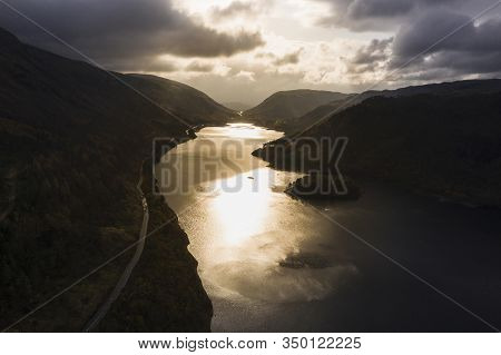 Beautiful Aerial Drone Landscape Image Of Glorious Autumn Fall Sun Over Thirlmere In Lake District