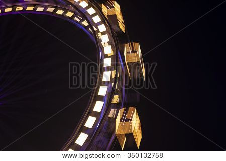 Ferris Wheel Fuzzy Motion Picture At Night Time Carnival Place Black Background Empty Copy Space For
