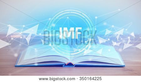 Open book with IMF abbreviation, modern technology concept