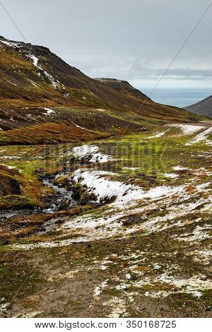 Mountains And Ocean View In Borgarfjordur Eystri In East Iceland In A Cloudy Day