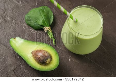 A Glass Of Spinach And Avocado On A Stone Table. Fitness Product. Dietary Sports Nutrition.