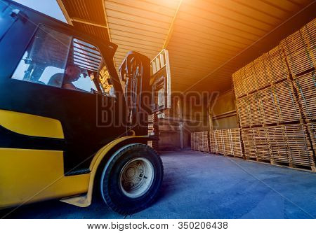 Forklift Loader Load Lumber Into A Dry Kiln. Wood Drying In Containers.