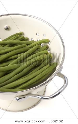 Feijão verde em Collander