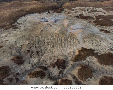 Beautiful Aerial View Of A Lunar Landscape  Over The Muddy Volcanoes, Paclele, Berca, Buzau County, 