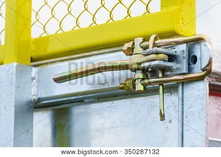 Close Up On Industrial Metal Made Handle Lock For Opening Semi Trailer