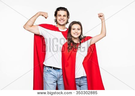 Young Couple Wear In Super Hero Cout Show The Power Isolated On White Background