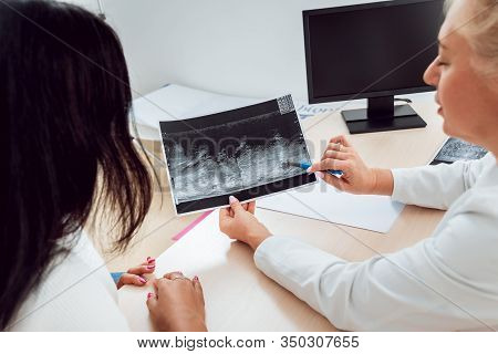 Doctor Get Examining Breast Of Young Woman. Consultation With Gynecologist.
