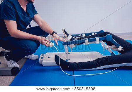 Patient On Cpm Machines. Continuous Passive Range Of Motion.