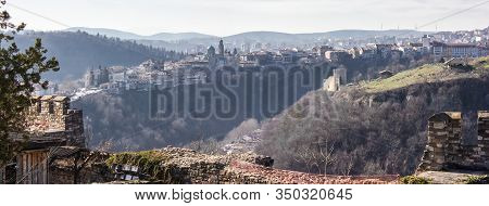 Early Morning Mist Rolling Down From The Hills On To The Rural Landscape Of Veliko Tarnovo, In Bulga