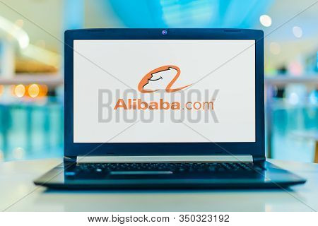 Laptop Computer Displaying Logo Of Alibaba