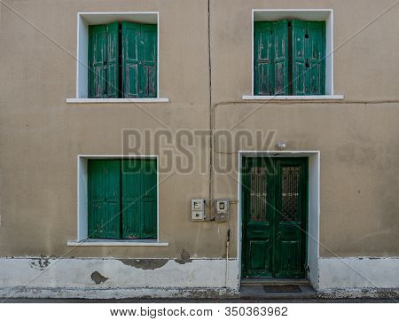 Traditional Greek Building With Green Shutters And Door In The Village Of Skala Eressos In Lesvos Gr