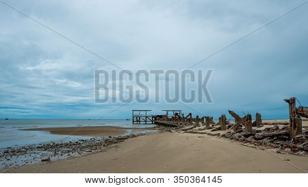 Dilapidated Old Fishing Dock Collapsing Into The Sea In Pak Nam Pran On The Gulf Of Thailand In Thai
