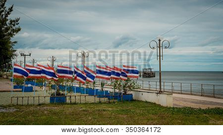 Many Flags On Poles In A Seaside Park In Prak Nam Pran Thailand