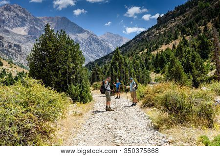 Turkey, Chamard - August 3, 2019: The Guide Shows Tourists The Direction Of The Road Through The Mou