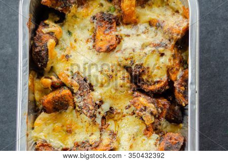Fried Potato Fries Coated  Topped With Mature Cheddar And Monterey Jack Cheeses, Jalapeno And Bacon