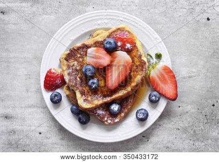 Delicious French Toast With Fresh Fruits And Maple Sirup. Tasty Breakfast Scene Or Dessert With Toas