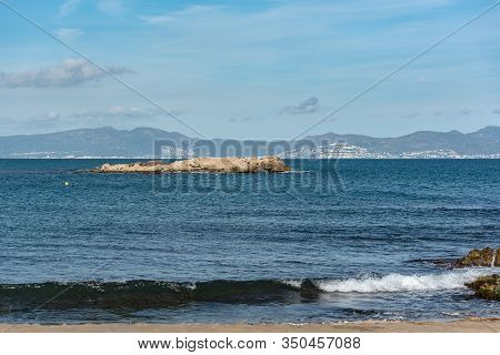 Platja De Les Muscleres In La Escala Behind The Ruins Of Empuries, In The Province Of Giron, Catalon