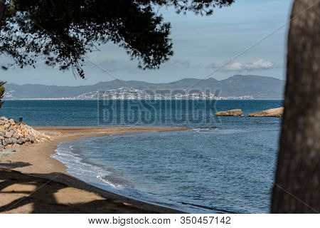 Platja De Les Muscleres In La Escala Behind The Ruins Of Empuries, In The Province Of Giron, Catalon
