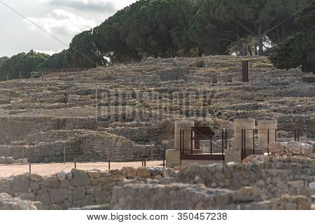 Ruins Of Ampuries, La Escala Behind The Ruins Of Empuries, In The Province Of Giron, Catalonia, Spai