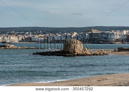 Grec Wall In Platja De Les Muscleres In La Escala Behind The Ruins Of Empuries, In The Province Of G
