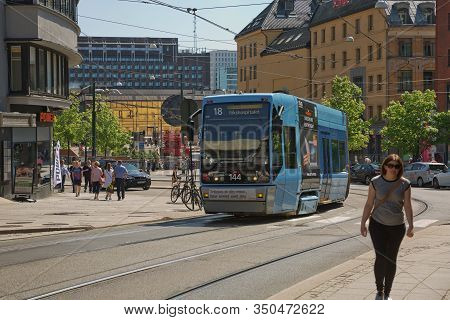 People Enjoying City Life During Sunny Summer Day At In Oslo, Norway