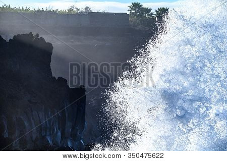 Dangerious Ocean Stormy Waves Hits Black Lava Rocks On La Palma Island, Canary, Spain