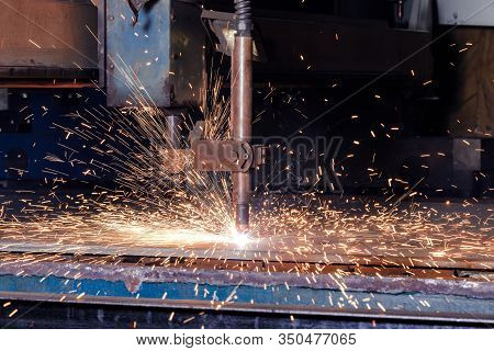 Plasma Cutting Of Metal With A Cnc. Plasma Cutting Machine Cutting Steel Sheet. Laser Cutter In Prod