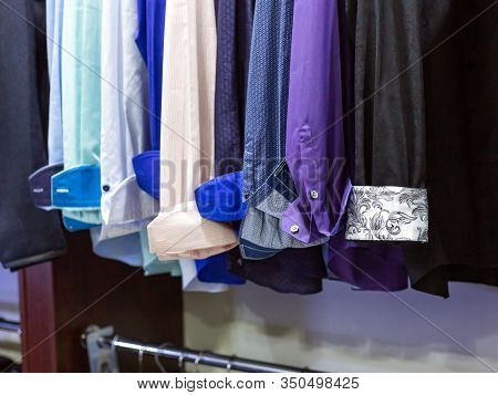 Wardrobe With Men's Shirts In Different Colors