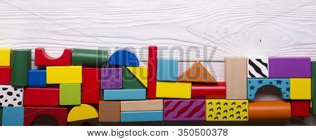 Kids Educational Developing Toys Frame On White Background. Top View. Flat Lay. Copy Space For Text