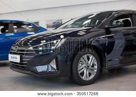 Russia, Izhevsk - January 23, 2020: New Modern Elantra Car In The Hyundai Showroom. Famous World Bra