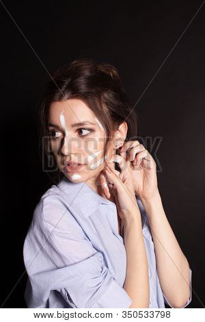 Fashion Beauty Portrait Of Beautiful Young Brunette Woman. White Paint On The Body And Face.