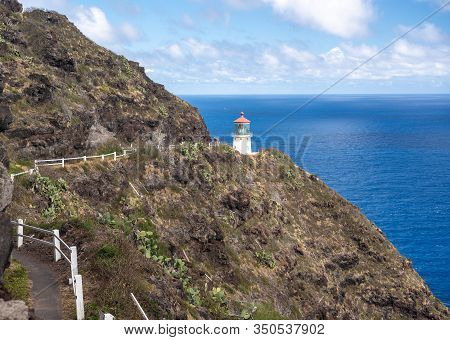 Old Lighthouse On The Cliff Side On Makapuu Point On Oahu In Hawaii