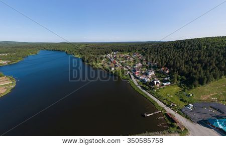 Aerial View Of Houses And Pond In Pervouralsk City. Summer