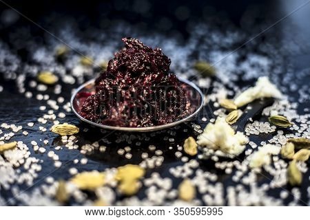 Close Up Of Fresh Beetroot Halwa Or Beet Ka Halwa In A Plate With Some Spread Sugar Crystals And Ela