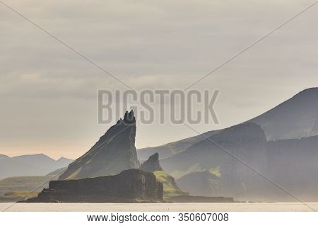 Faroe Islands Sunset Dramatic Coastline Landscape In Vagar Island. Seascape