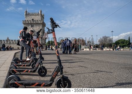 Lisbon, Portugal - January 17, 2020: Circ Scooters For Rent On A Sidewalk In Lisbon Near Belem Tower