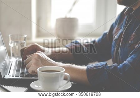 Businessman Working On Desk At Home Office Business