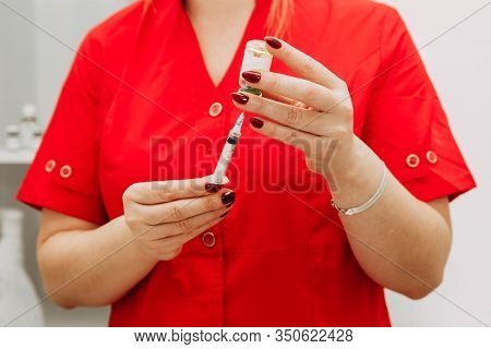 Vaccination For People, Injection. Doctor With Syringe. Coronavirus Doctor Makes Vaccination. Select