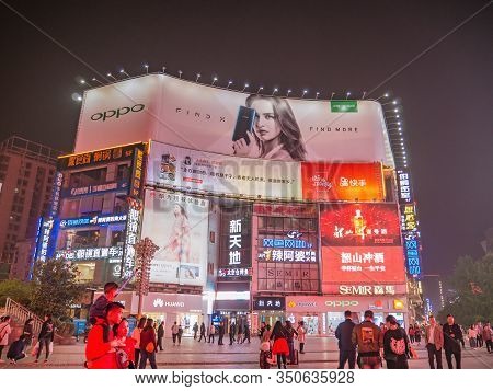 Changsha/china-17 October 2018:unacquainted People Walking On Huangxing Walking Street In Changsha C