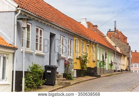 Colorful Historic Houses In A Cobblestoned Street Of Haderslev, Denmark