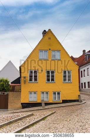 Yellow House In The Cobblestoned Street Of Haderslev, Denmark