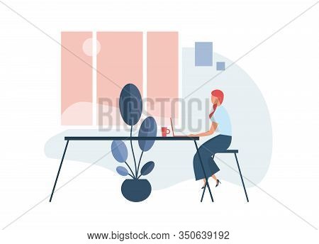 Businesswoman Using Laptop In Office. Female Entrepreneur In Formal Wear Sitting On Stool At Table A