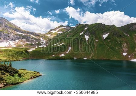 Hidden Alpine Lake In German Alps During Summer Hikes