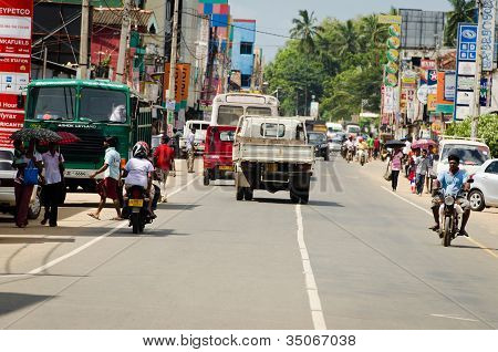 Intensive Traffic On Narrow Asian Street